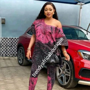 Latest Adire leggings and top. One size fit up to 1XL. Classic tie and dye set for that casual outing is here for purchase. Leggings is stretchy to fit up to XL/1XL. Black/yellow.