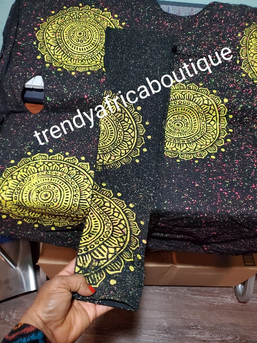 Sale sale: Latest Adire leggings and top. One size fit up to 1XL. Classic tie and dye set for that casual outing is here for purchase. Leggings is stretchy to XL/1XL. Black/yellow.