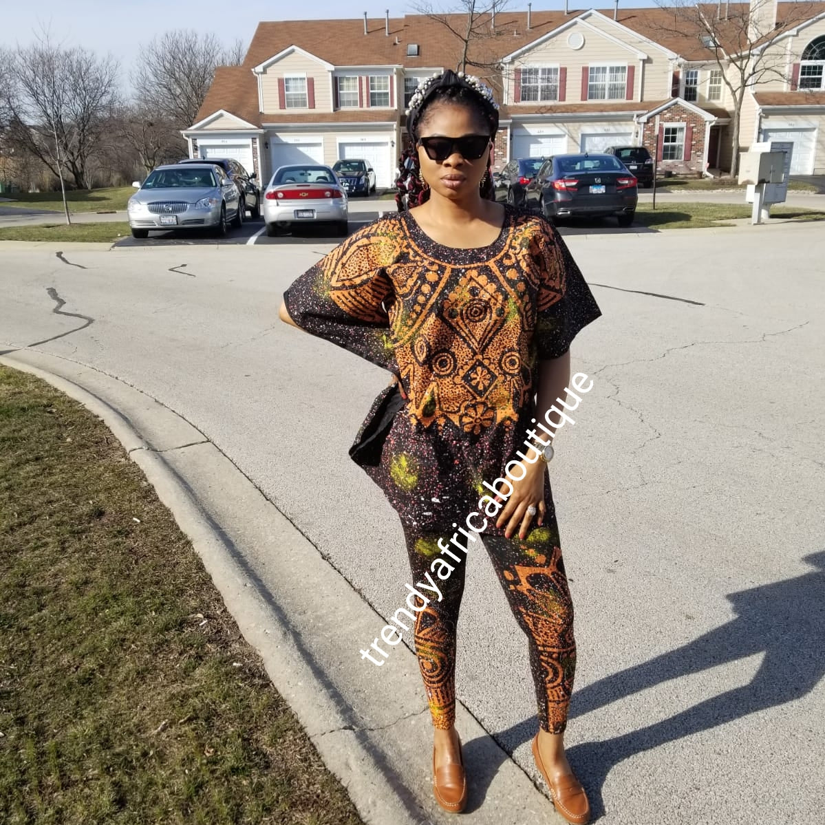 Latest Adire leggings and top embellished with crystal stones One size fit M/Large. burst 48", top lenght 35" Classic tie and dye set for that casual outing is here: Black/yellow gold/white