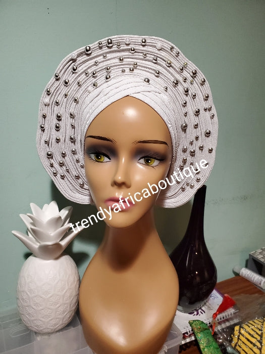 Clearance: Pure white Auto-gele. Nigerian aso-oke made into auto gele. Silver beaded. Party ready in less than 5 minutes. One size fit, easy adjustment at the back. Made with quality aso-oke
