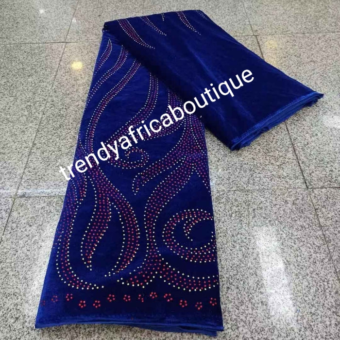 Royal blue VELVET wrapper embellished with colorful crystal stores. So soft with high quality for making Nigerian traditional wedding 1st outfit for. Sold per 5yds. Price is for 5yds.