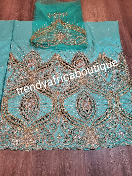 Ready to ship: Mint Green VIP hand beaded and stoned Nigerian traditional Celebrant George wrapper with matching blouse. With a choice of mint green gele. Niger/Delta/Igbo wrapper Quality George wrapper for high society party.