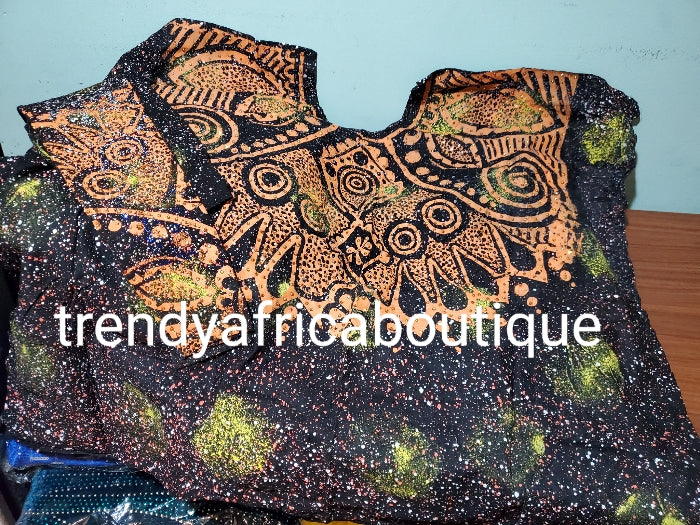 Latest Adire leggings and top embellished with crystal stones One size fit small/Medium burst 44", top lenght 35" Classic tie and dye set for that casual outing is here: Black/orange/white