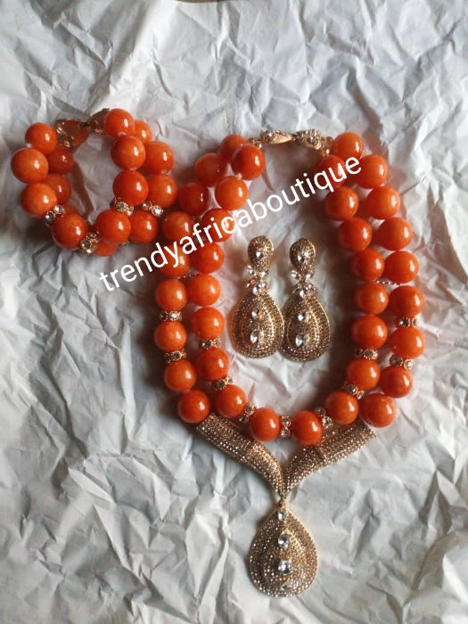 New arrival 2 role original coral beaded choker necklace set with nice stoned drop pendant, ring, bangle. Coral-necklace set for Nigerian wedding. Sold as a set