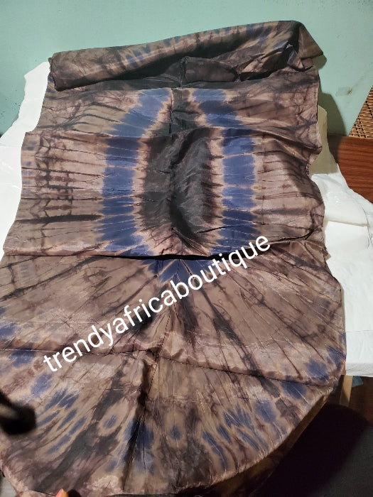 Adire silk fabric. Tie and dye or kampala sold as 4yards a piece. Brown/blue color. Grade A quality