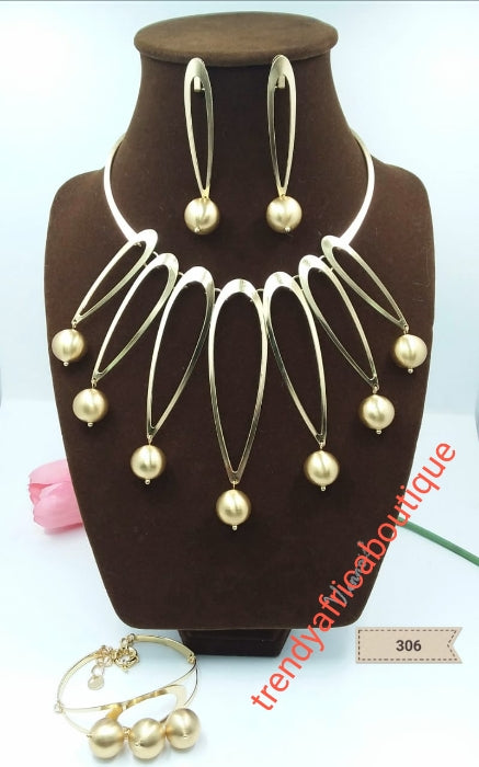 3pcs 18k Gold electroplated Dubai Necklace, drop earrings, and adjustable bracelet. Long lasting hypoallergenic plating. Sold as a set and price is for the set.