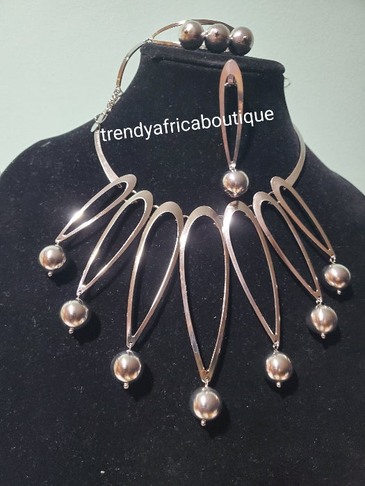 3pcs 18k silver electroplated Dubai Necklace, drop earrings, and adjustable bracelet. Long lasting hypoallergenic plating. Sold as a set and price is for the set.