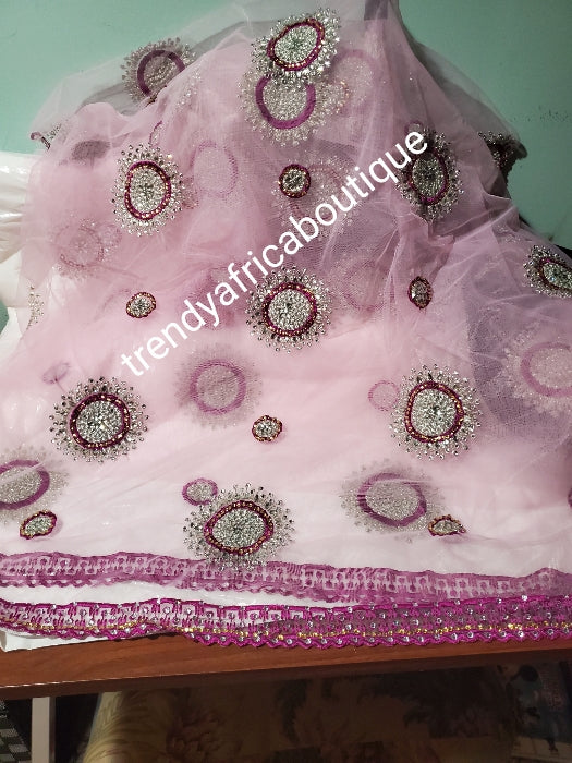 New arrival: Nigerian/Igbo/Delta Traditional George magenta wrapper + baby pink contrast net for blouse. Embellished with crystal stones. wrapper and net blouse. Beaded and stoned. -George and hand stoned quality taffeta silk. Top quality hand work