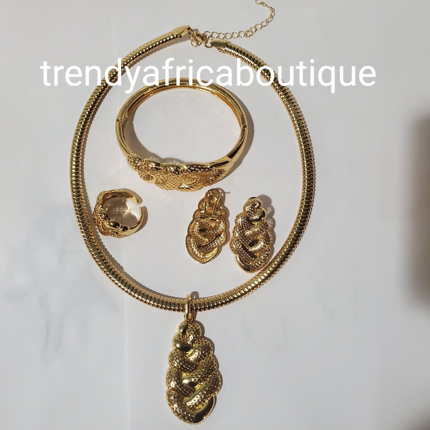 4pcs 18k electroplated choker pendant set. drop pendant, earrings, bangle & adjustable ring set.Long lasting hypoallergenic plating. Sold as a set and price is for the set.