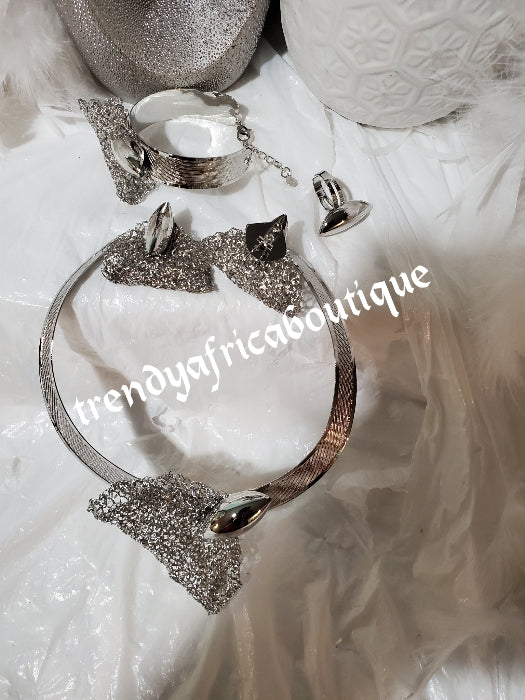 Elegant Silver set: Elegant Dubai 4pcs 18k electroplated choker necklace, matching earrings, bangle & adjustable ring. hypoallergenic plating. Sold as a set and price is for the set. As shown in display photo.