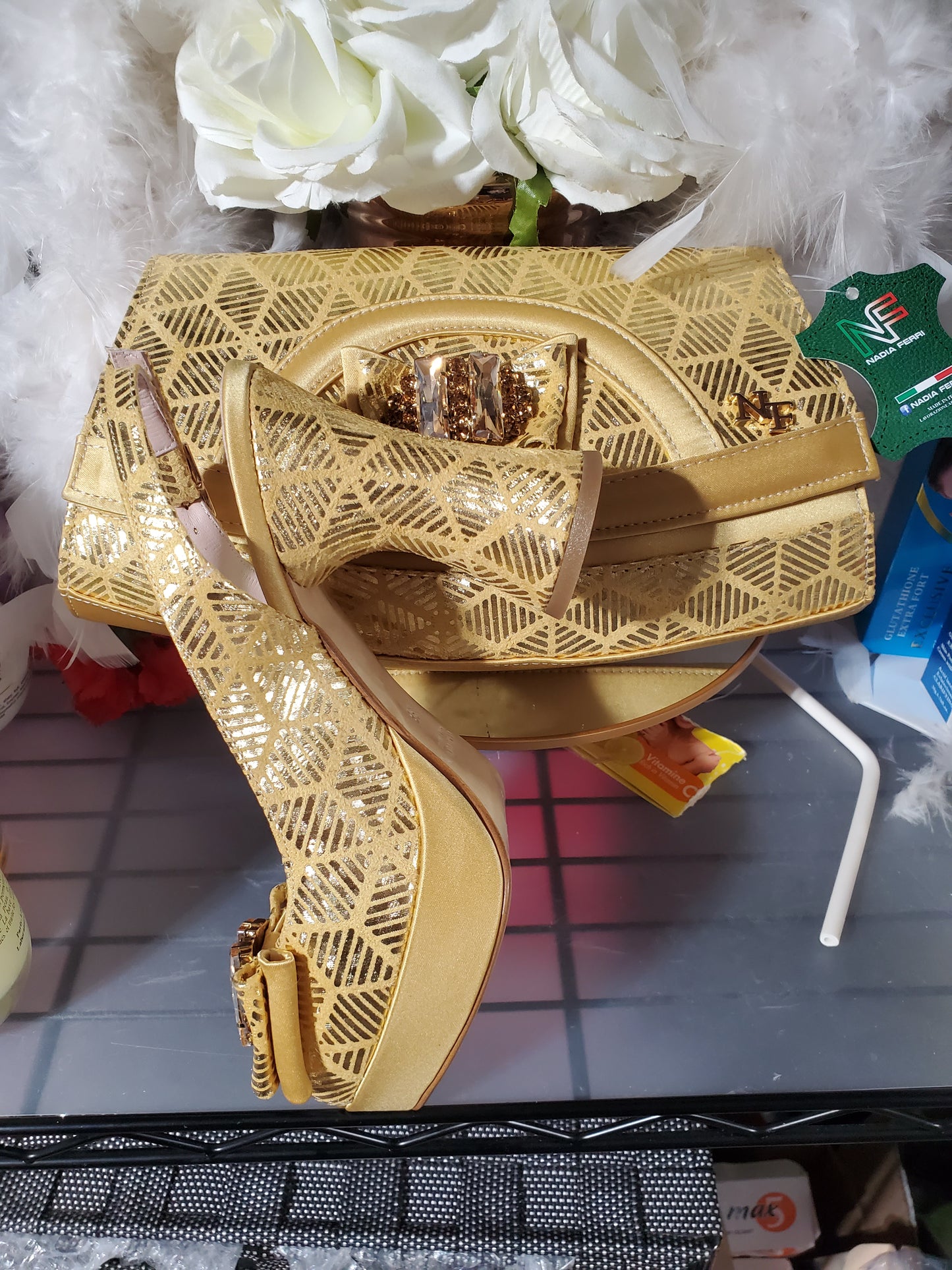 Europe size 38 GOLD ITALIAN shoe & bag set. Platform heal with matching stylish handbag embellished dazzling crystals. Comfortable and well balanced shoe. True to size.  4 inches platform heal. Shoe/bag. Nadia ferri made in Italy