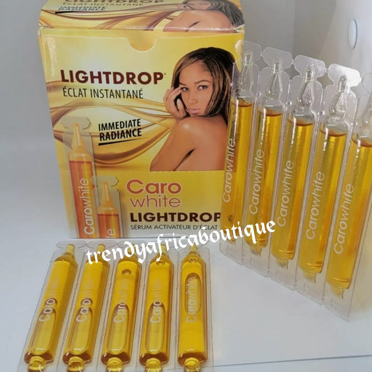 20 ampoules sale: Caro light white drop clears dark knuckle, dark elbows, dark knees, hyperpigmentation activating serum & oil for immediate radiance. Formulated with carrot extracts + vit. E.