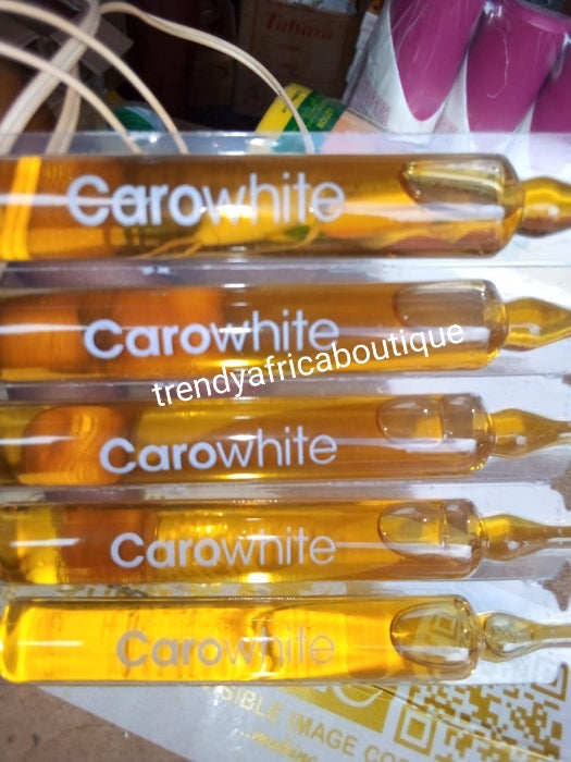 20 ampoules sale: Caro light white drop clears dark knuckle, dark elbows, dark knees, hyperpigmentation activating serum & oil for immediate radiance. Formulated with carrot extracts + vit. E.