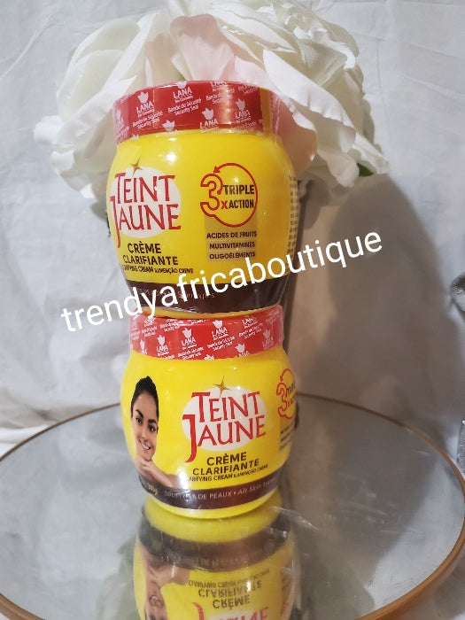 X2 Teint Jaune triple formula lightening & glowing body CREAM SUPER RAPID, TRIPLE ACTION 300g per cup. Carote oil & vitamin E.