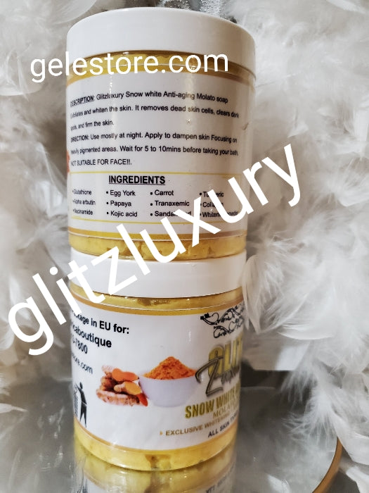 2pcs BANGA!! Glitzluxury yellow sisi Exfoliating & foaming salt scrub & SNow white anti-aging Molato whitening soap👌👌with egg yolk, turmeric & organic salt. Super skin glowing, lightening & Exfoliating