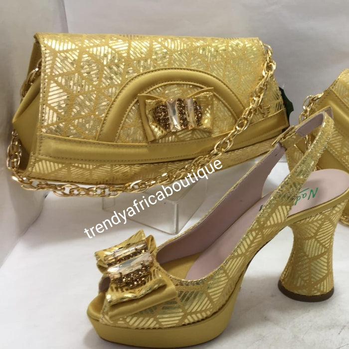 Europe size 38 GOLD ITALIAN shoe & bag set. Platform heal with matching stylish handbag embellished dazzling crystals. Comfortable and well balanced shoe. True to size.  4 inches platform heal. Shoe/bag. Nadia ferri made in Italy