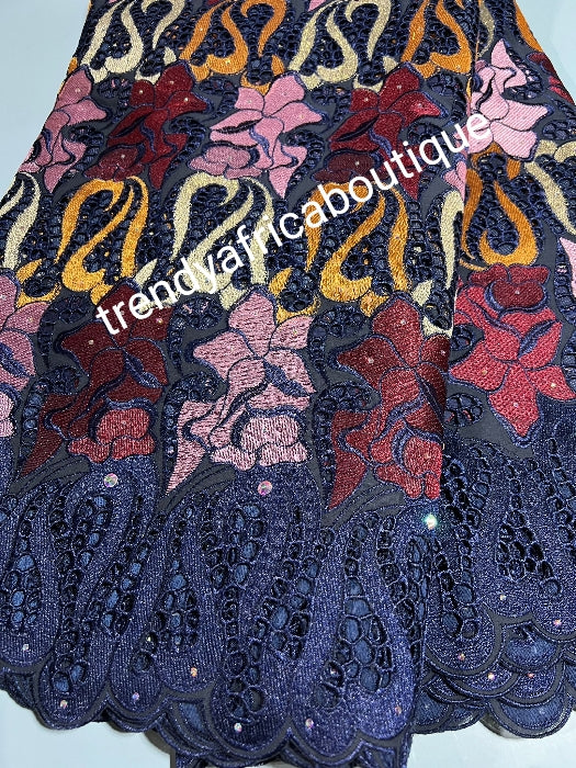 Exclusive swiss lace fabric Navyblue/pink/gold. Nigerian traditional celebrant Swiss lace embroidered with quality tread and all over crystal dazzling stones beautiful border design  Sold per 5yds