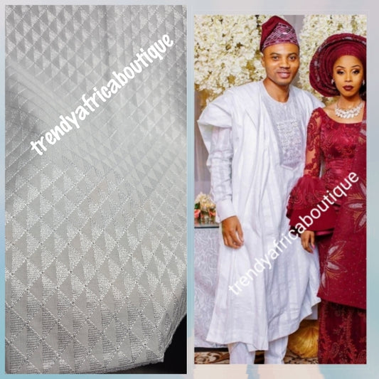 New arrival luxury White cotton swiss lace fabric for men.  Nigerian native traditional outfit. Soft quality fabric. Can be use for agbada/3pc outfit for men. Sold per 5yds. Price is for 5yds