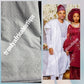 New arrival luxurious White cotton swiss lace fabric for men.  Nigerian native traditional outfit. Soft quality fabric. Can be use for agbada/3pc outfit for men. Sold per 5yds. Price is for 5yds.