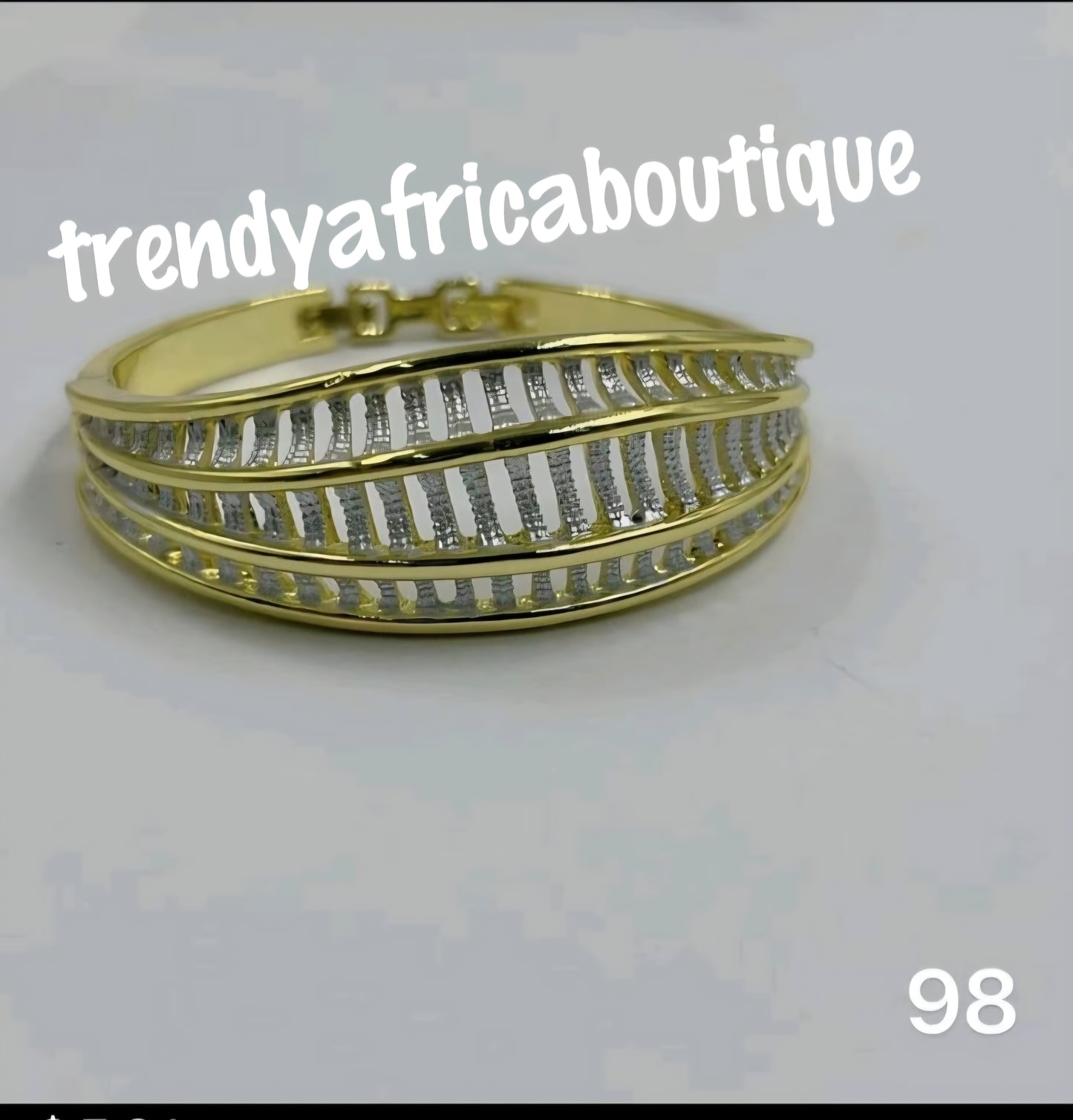 High quality gold plated 2 tone bangle bracelet. beautiful statement bangle. Luxury bangle one size fit, hypoallergenic plating
