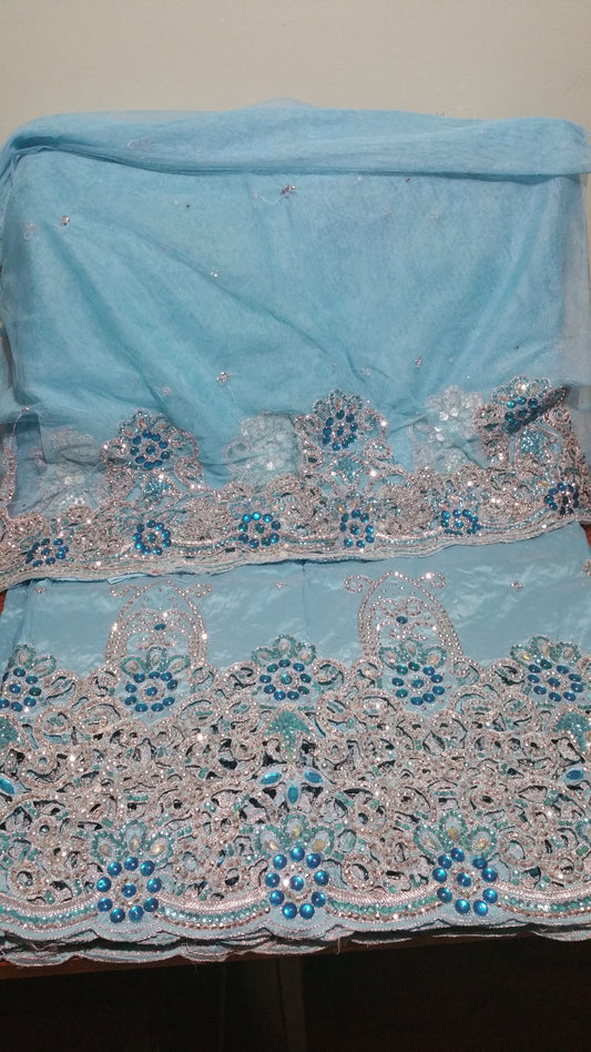 CLEARANCE Item Sky blue hand Stoned silk taffeta George wrapper with hand stones. 5yds. Wrapper & 1.8yds net blouse