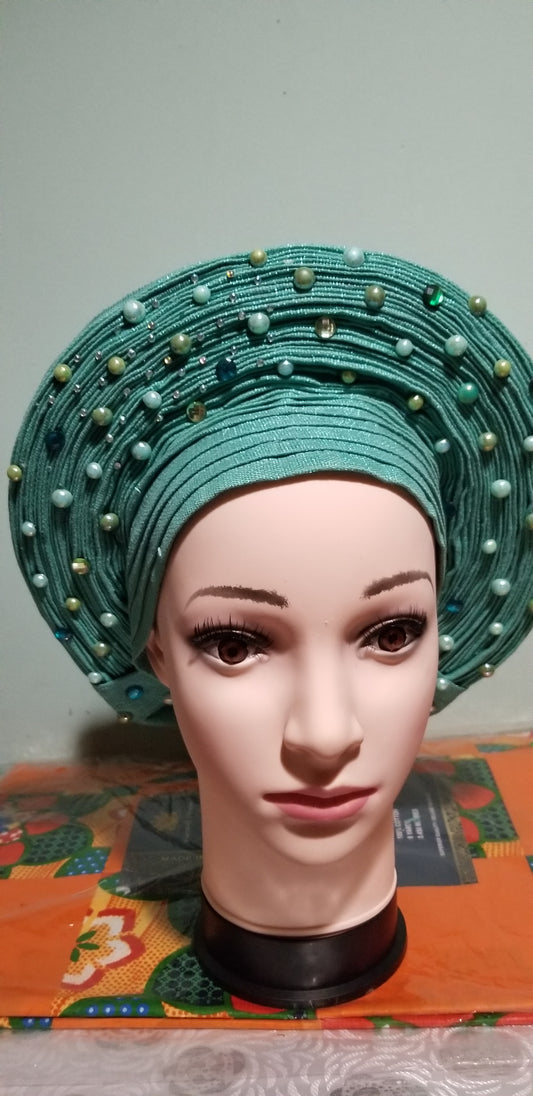 Mint green Auto-gele beaded and stoned. All made gele ready to wear. One size fit