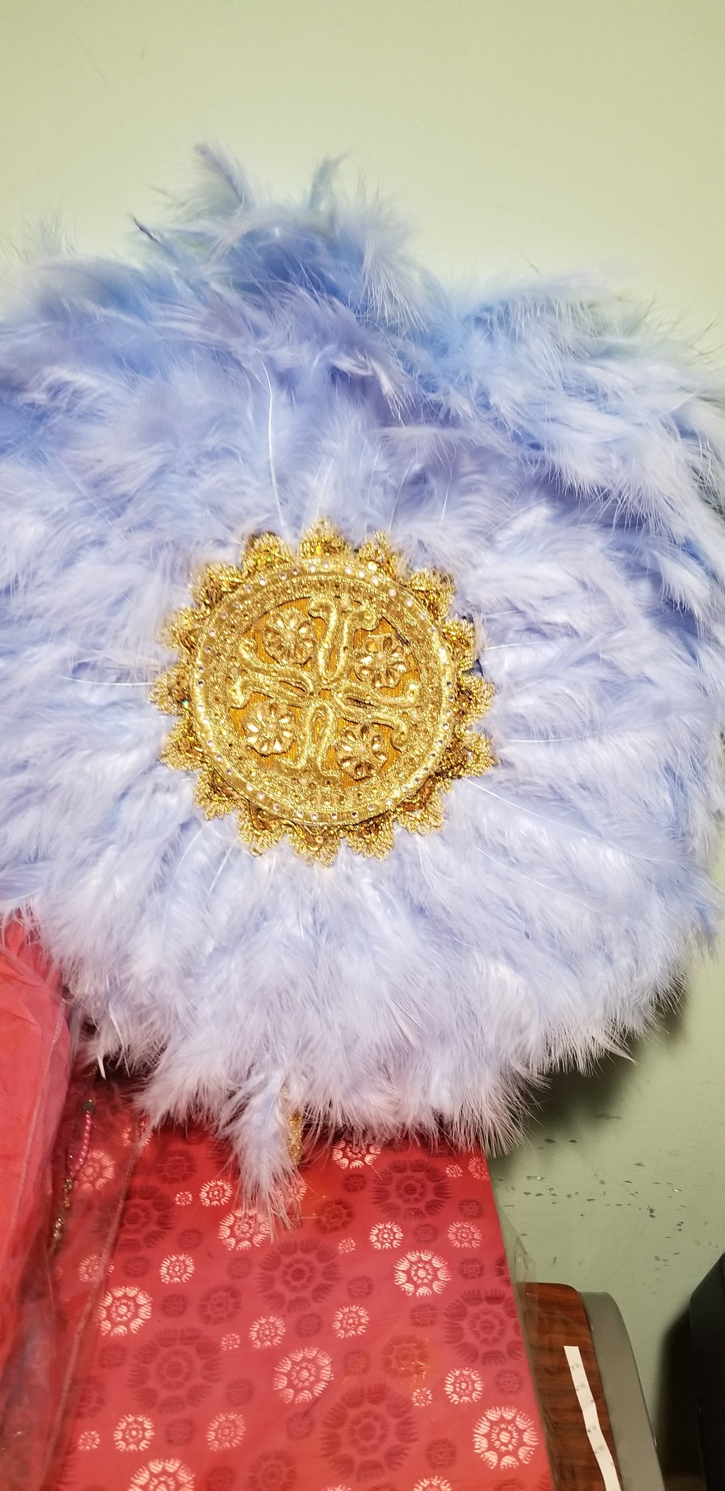 Lateat feather hand fan in beautiful powder blue color. Bridal Accessories hand fan for celebrant. Fully handmade with handle. Nigerian Bride fluffy feathers hand fan