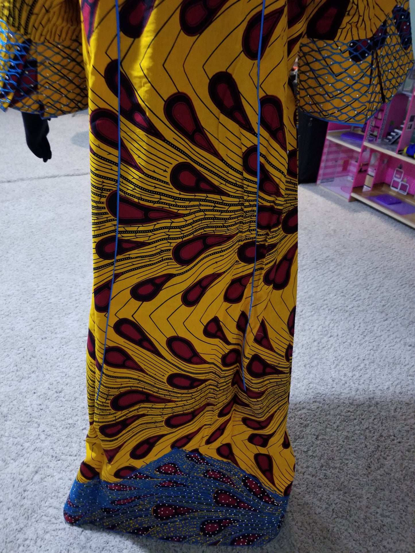 Lateast Nigerian Ankara-dress. Ankara-kaftan Full lenght embriodered and embellished with all over shinning crystal stones to perfection. 63inch full lenght. This is a 44 inches Burst size. Have room on the inside for adjustment