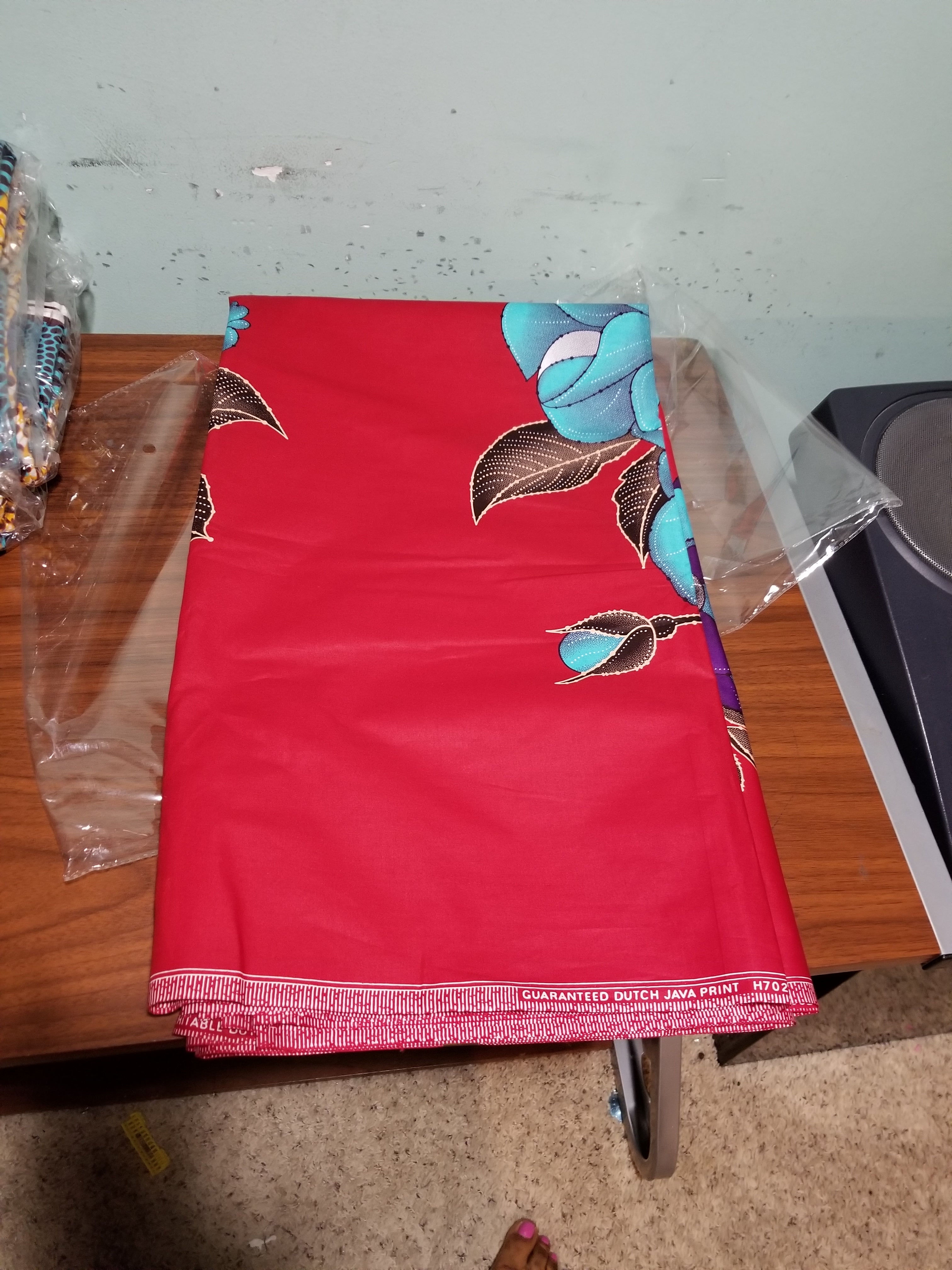 Rich Botanical Bloom Fabric – Earthy Red Ankara Wax Print with Intricate Floral and Leaf Motifs