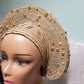 Beautiful champagne gold Auto-gele made with quality Aso-oke. Beaded and stoned work front and back to perfection.  One size fit, easy to adjust for fit and knot at the back to secure your gele. This is true original auto gele