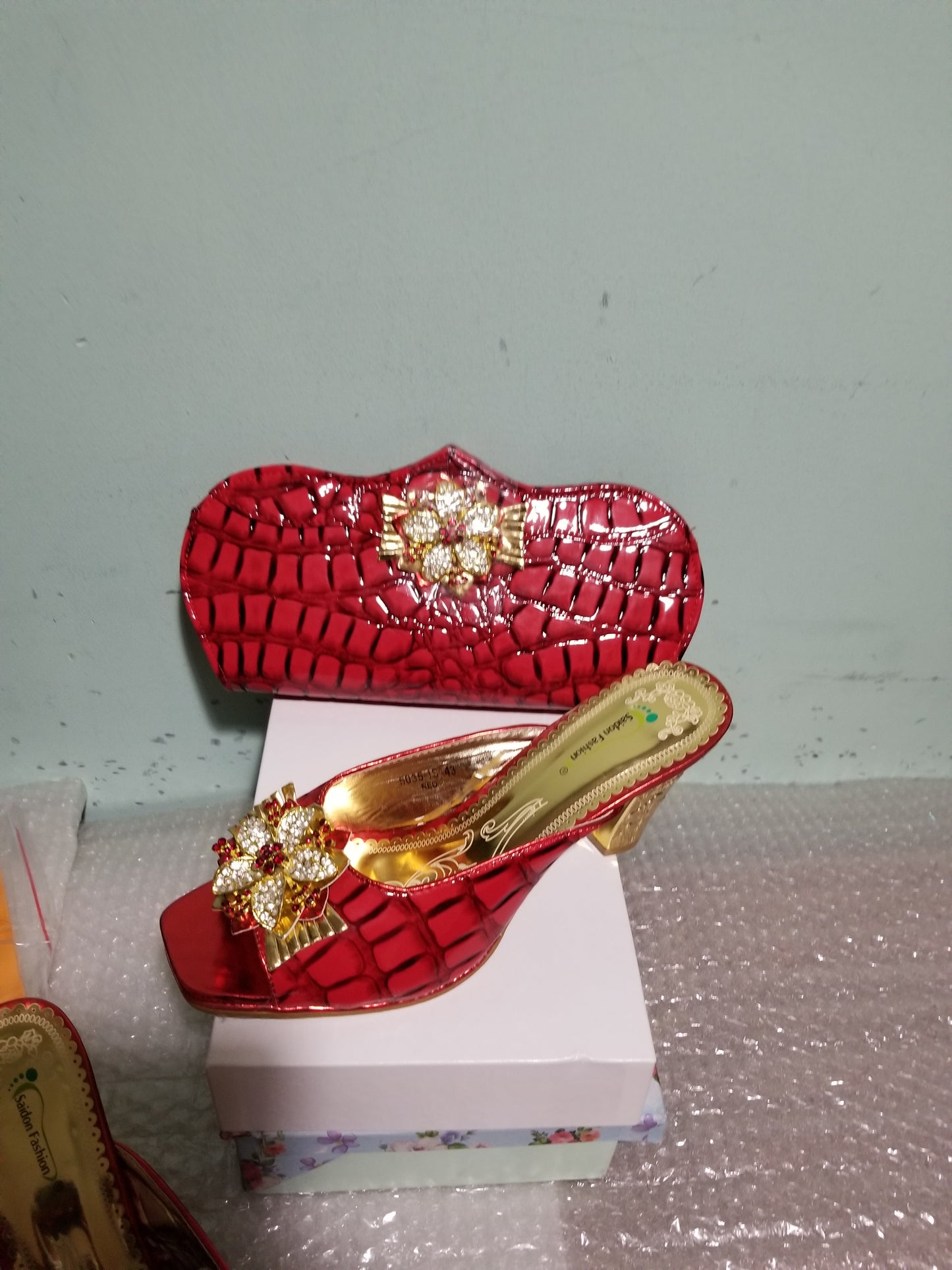 Sale: Size 39 Red Italian style matching slipper shoe and hand clutch. Quality made shoe and bag. 3" heel Sold as a set