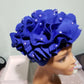 Royal blue color Women-turban. One size fit all turban. Beautiful flower design with a side brooch/beaded and stoned to add decor to your turban