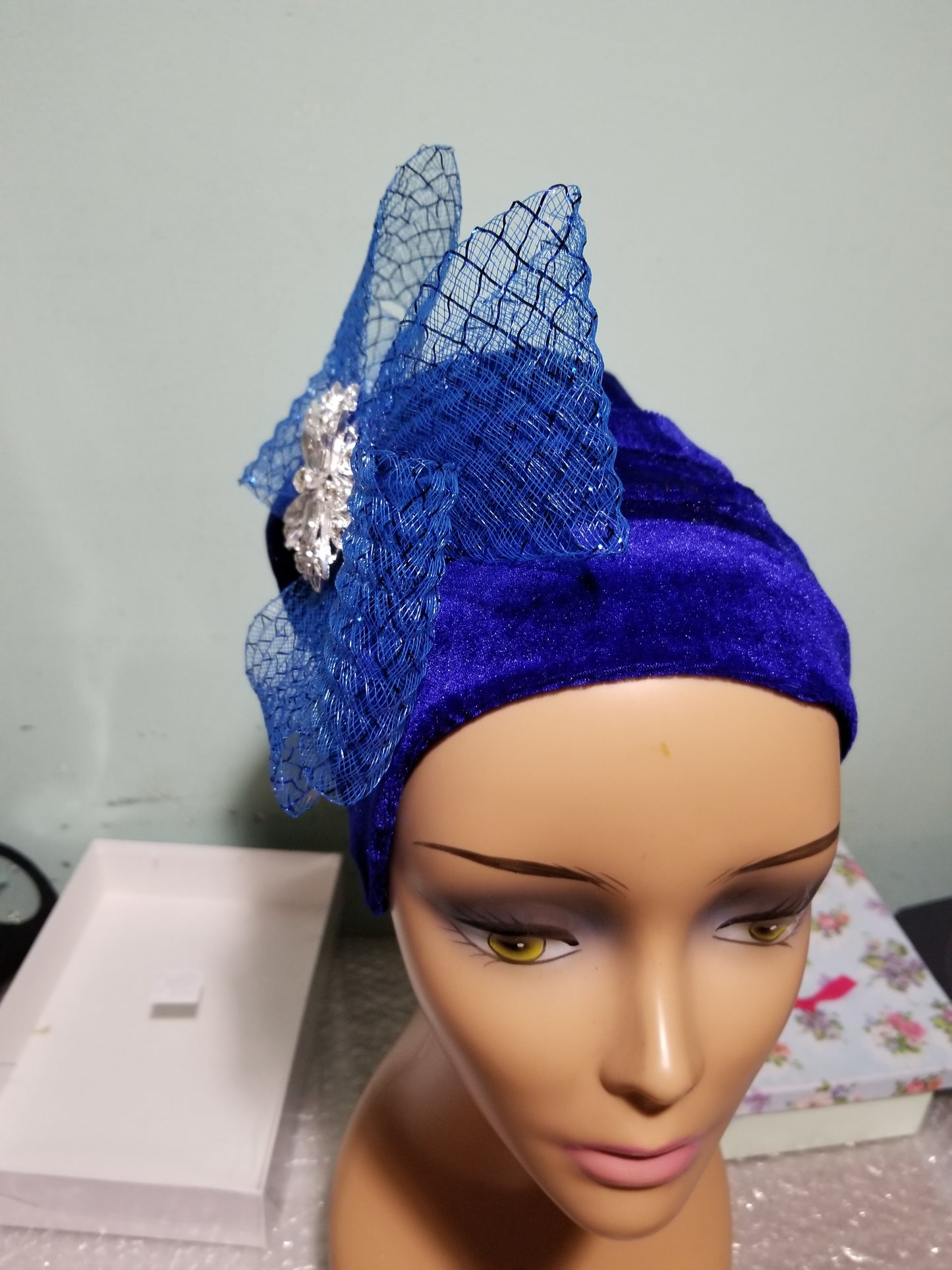 Soft Velvet/net royal blue  color Women-turban. One size fit all turban. Beautiful flower design with a side brooch/beaded and stoned to add decor to your turban
