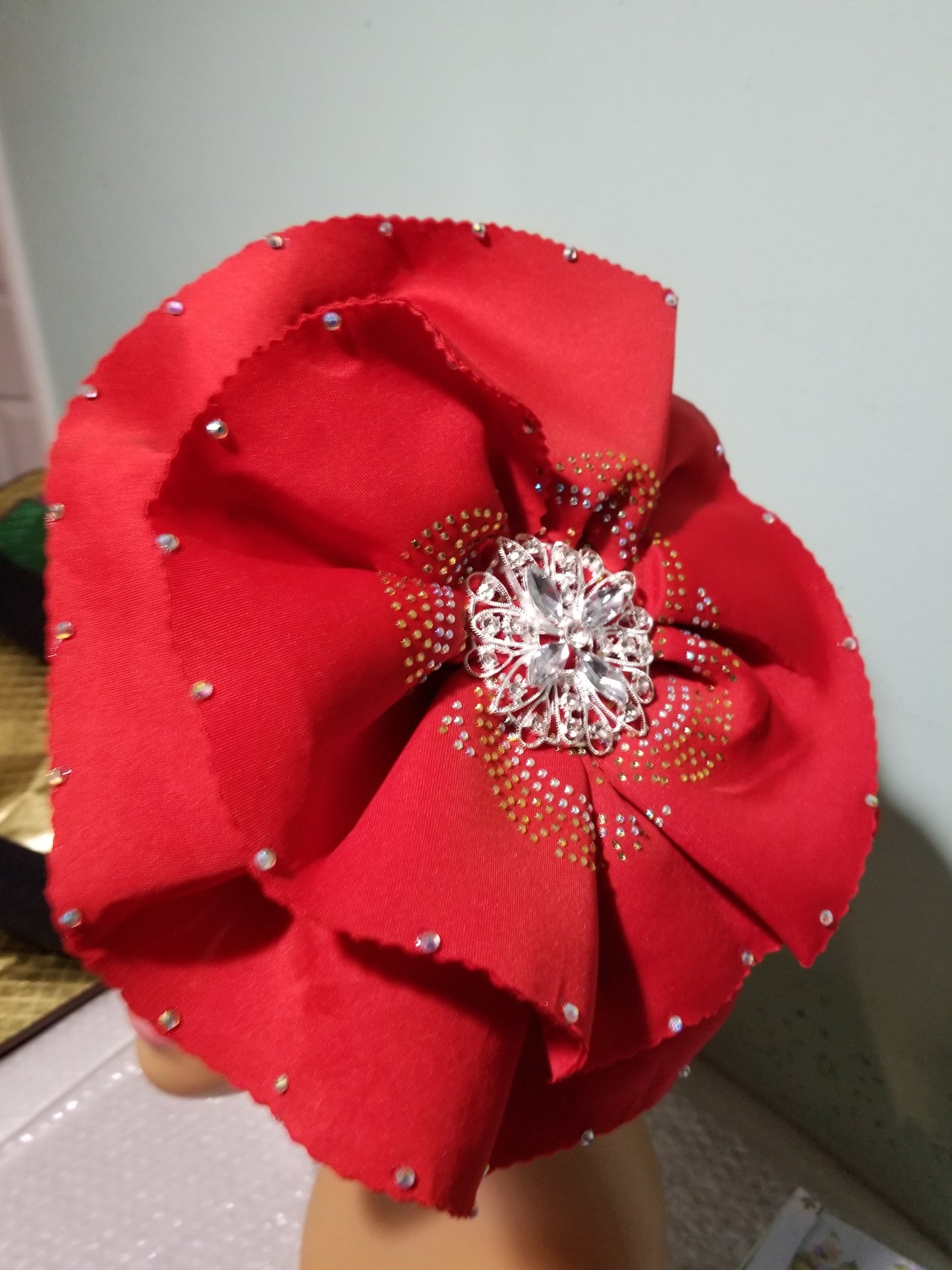 Red color Women-turban. One size fit all turban. Beautiful flower design/ crystal stones with a side brooch to add decor to your turban