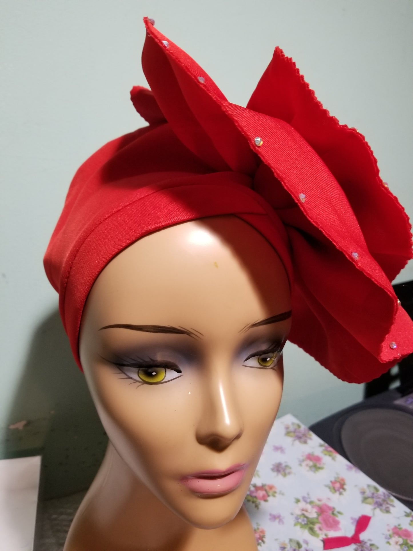 Red color Women-turban. One size fit all turban. Beautiful flower design/ crystal stones with a side brooch to add decor to your turban