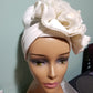 Off white color Women-turban. One size fit all turban. Beautiful rose flower design with a side brooch to add decor to your turban