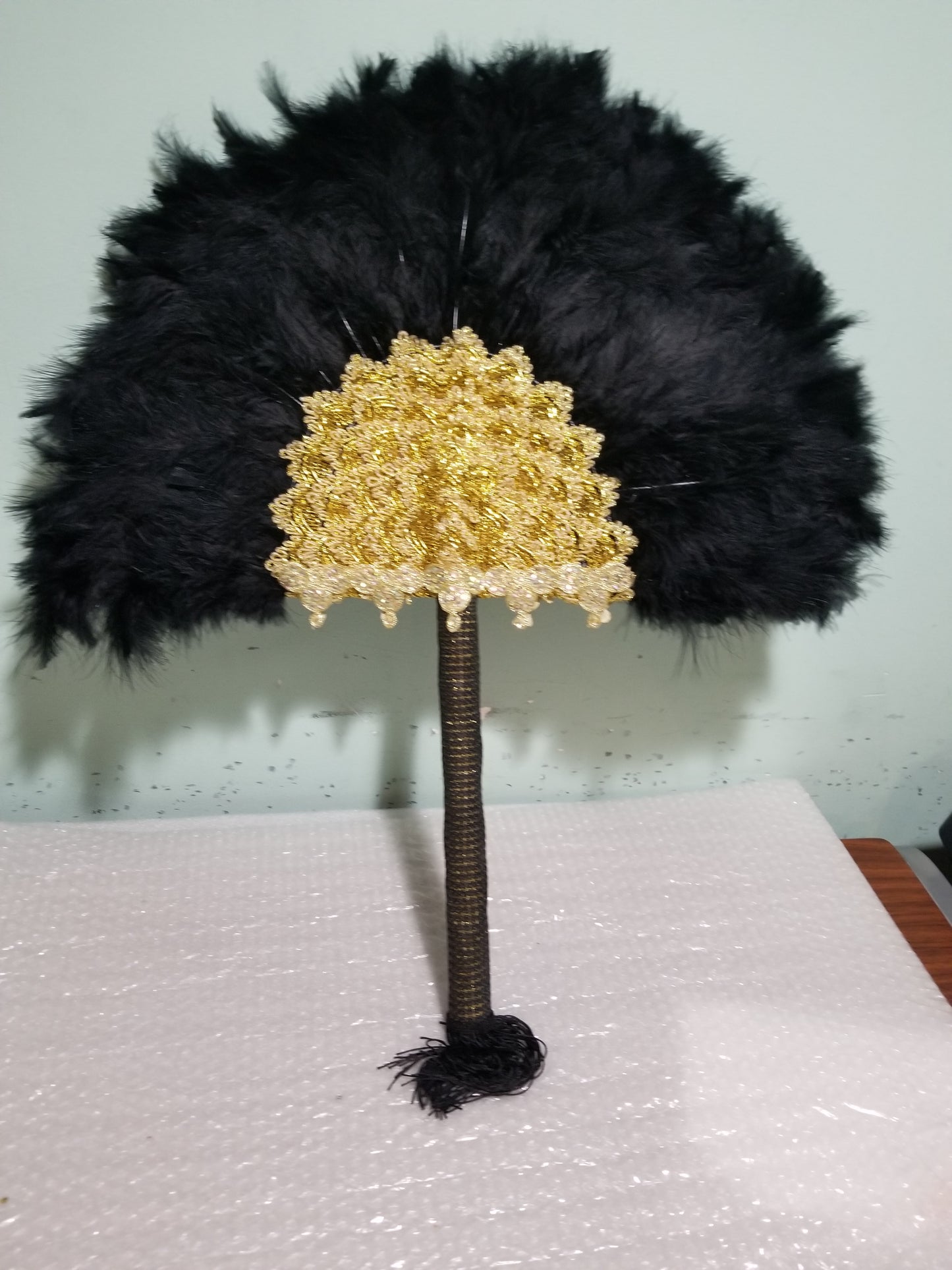 Black/Gold, Nigerian hand made Feather hand fan. Custom made, front/back same design.  Large size fluffy feather fan Nigerian Bridal-accessories design with flower petal, long handle with tassles