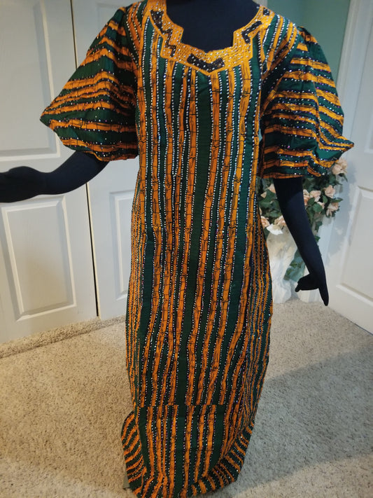 Sale sale: green/orange embroidered Ankara-dress, embellished with shinning Swarovski stones to perfection! Fit Burst 48" and 60" lenght shoulder to floor. Made with Quality hitarget Ankara. Comes with a matching headtie.