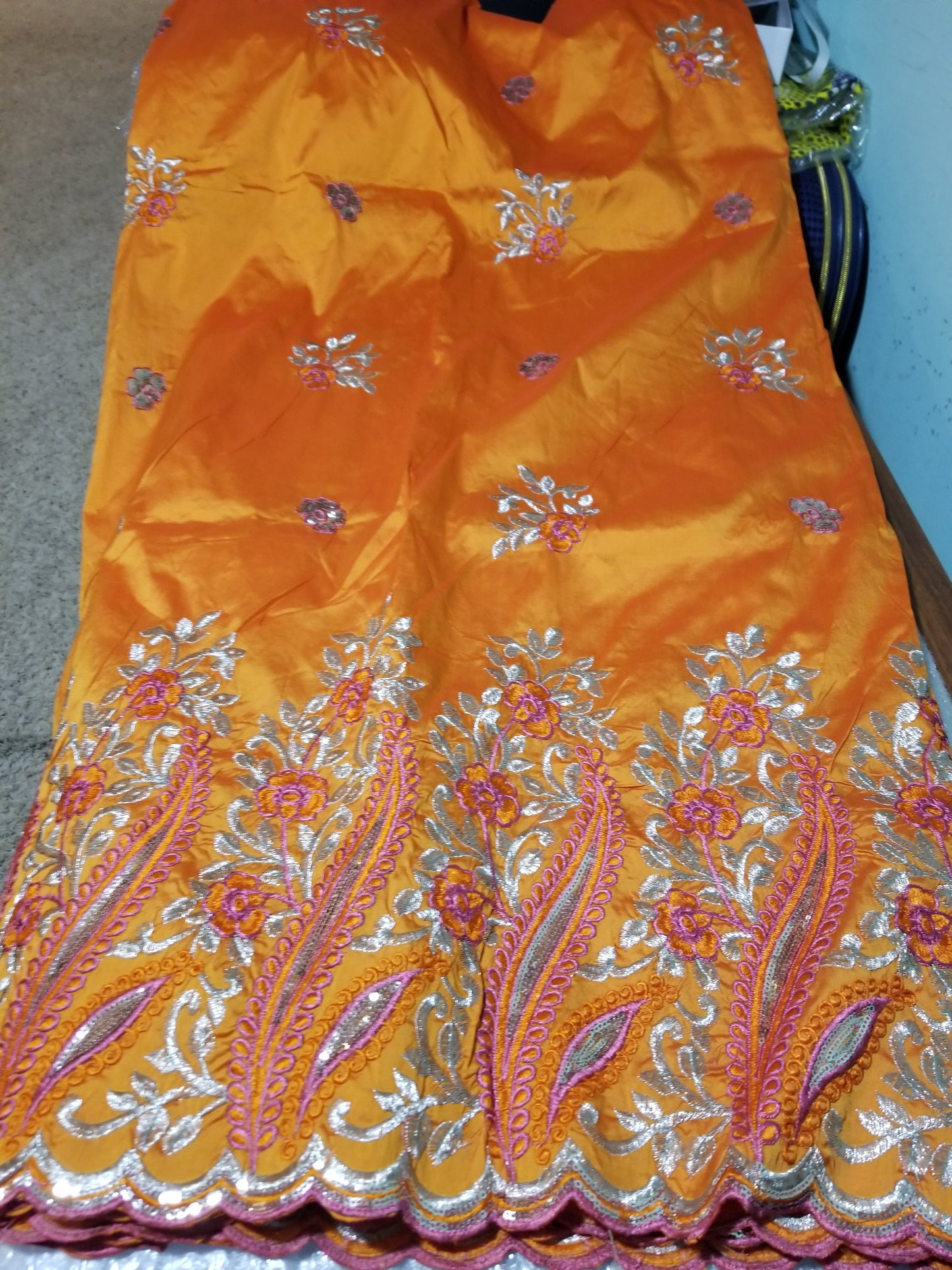 Clearance item: Orange Embriodery silk Geoge fabric. Beautiful flower border. Original quality George for making African party dress. Indian-George sold per 5yards and price is for 5yds