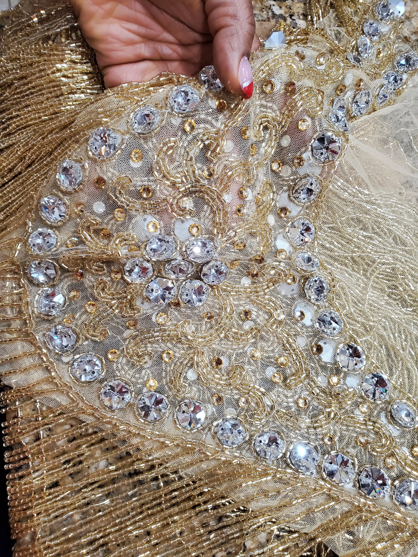 Champagn/gold beaded/crystal stones net for making wedding blouses or blouse combination. Popularly use by Igbo/Delta/edo women for big Occasions. Comes front & back design  for your beautiful blouse