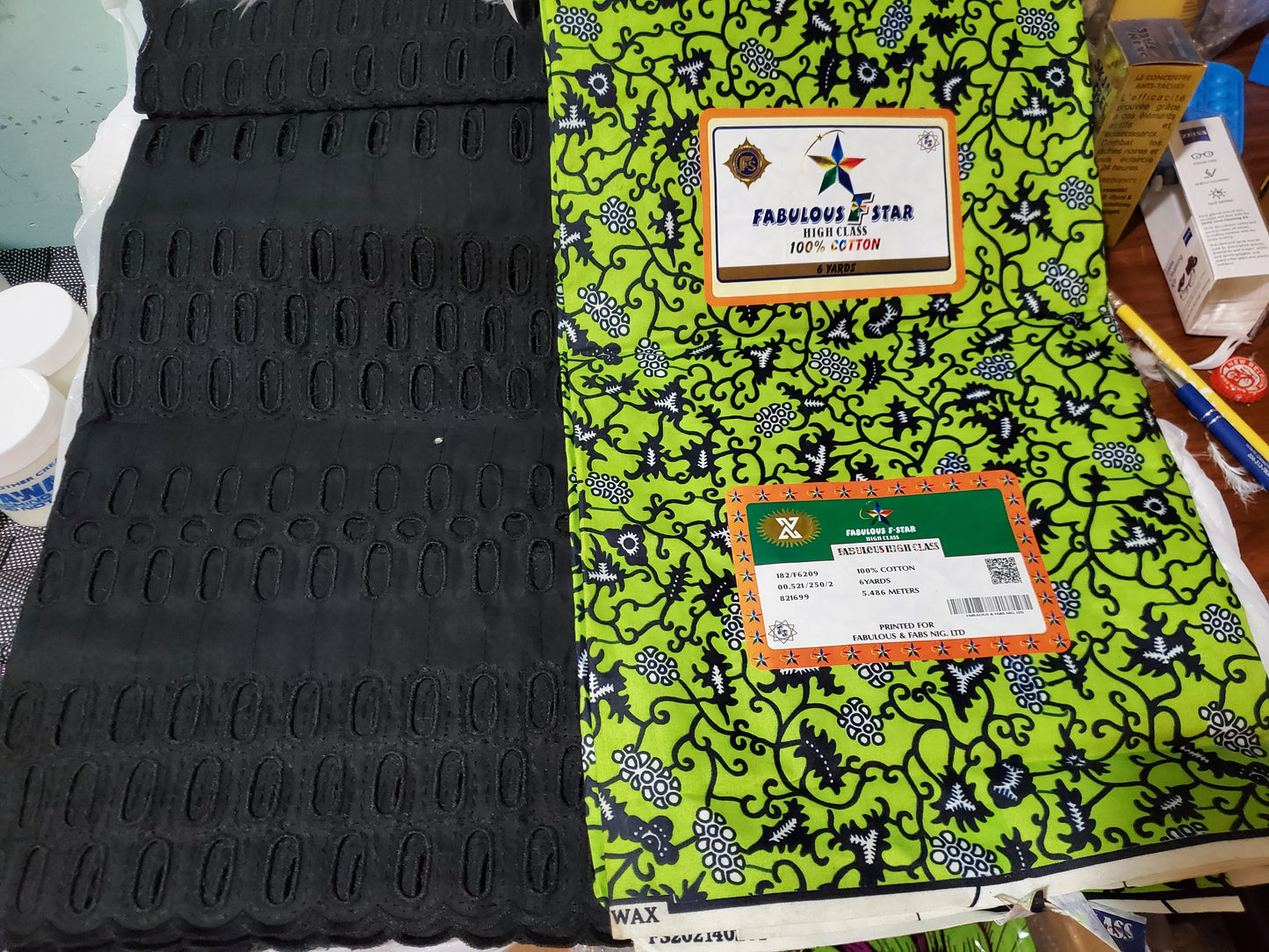 New African wax print- green Ankara + black dry lace combination pack. 3yard ankara and 2 yards dry lace in a pack. Luxuriouse quality ankara.  Veritable wax print