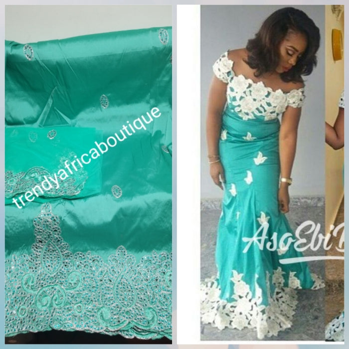 Back in stock: Mint green embriodery George fabric. Top quality Indian-George for making Nigerian/African party dress. 5yds silk George + 1.8yds matching net blouse. Contact us if you are interested in Aso-ebi order