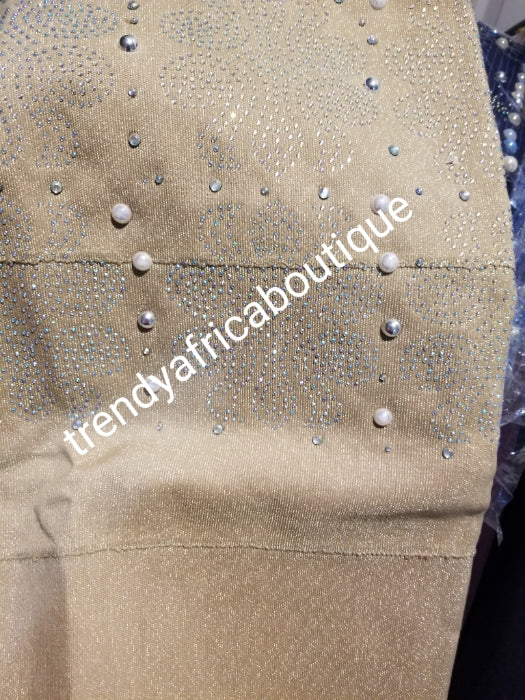 Champagne Gold/ aso-oke gele. Beaddazzled with silver crystal border. Original quality from Nigeria beaddazzled border for a more creative head wrap