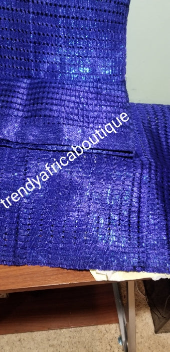 Latest Metalic Aso-oke from mother land. Dazzling Royal blue original Quality 2pcs Gele/Ipele set. Holes and strings aso-oke with shining metallic look. This is the newest aso-oke