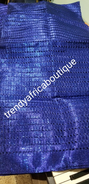 Latest Metalic Aso-oke from mother land. Dazzling Royal blue original Quality 2pcs Gele/Ipele set. Holes and strings aso-oke with shining metallic look. This is the newest aso-oke