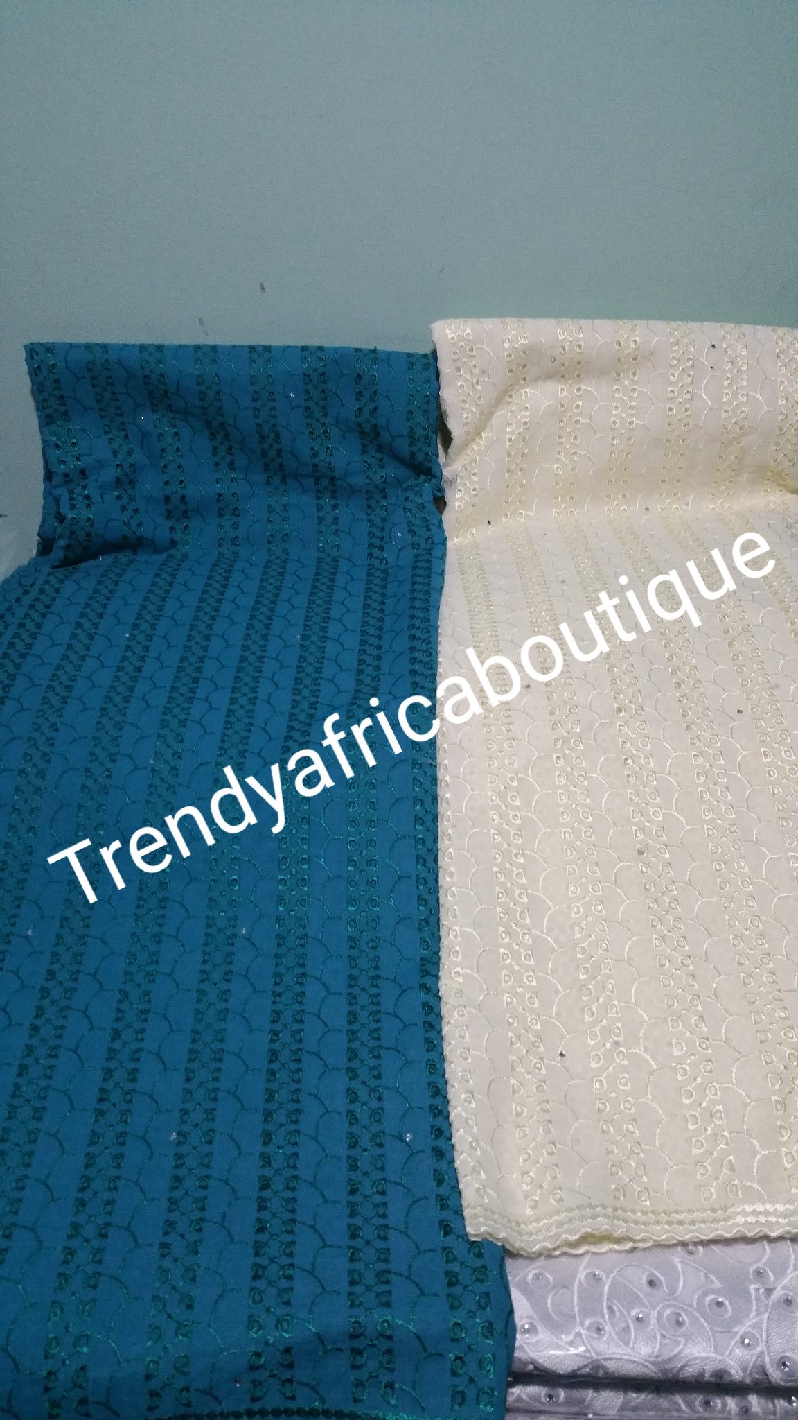 Assorted colors: Atiku swiss voile lace fabric for Nigerian Men native outfit. Soft quality fabric. Can be use for agbada too. Sold per 5yds.
