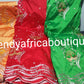 Embroidery Indian Silk George wrapper. Sold 5 yards lenght.embroidery and stones design for African party dress. Available in Green, red and Orangel. Small-George