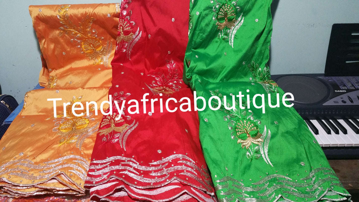 Embroidery Indian Silk George wrapper. Sold 5 yards lenght.embroidery and stones design for African party dress. Available in Green, red and Orangel. Small-George