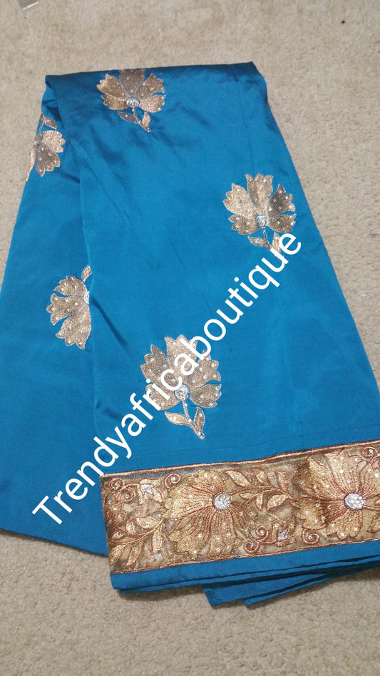 Sale: Turquoise blue/Gold silk George wrapper. Original quality African George sold as 5yrds lenght.