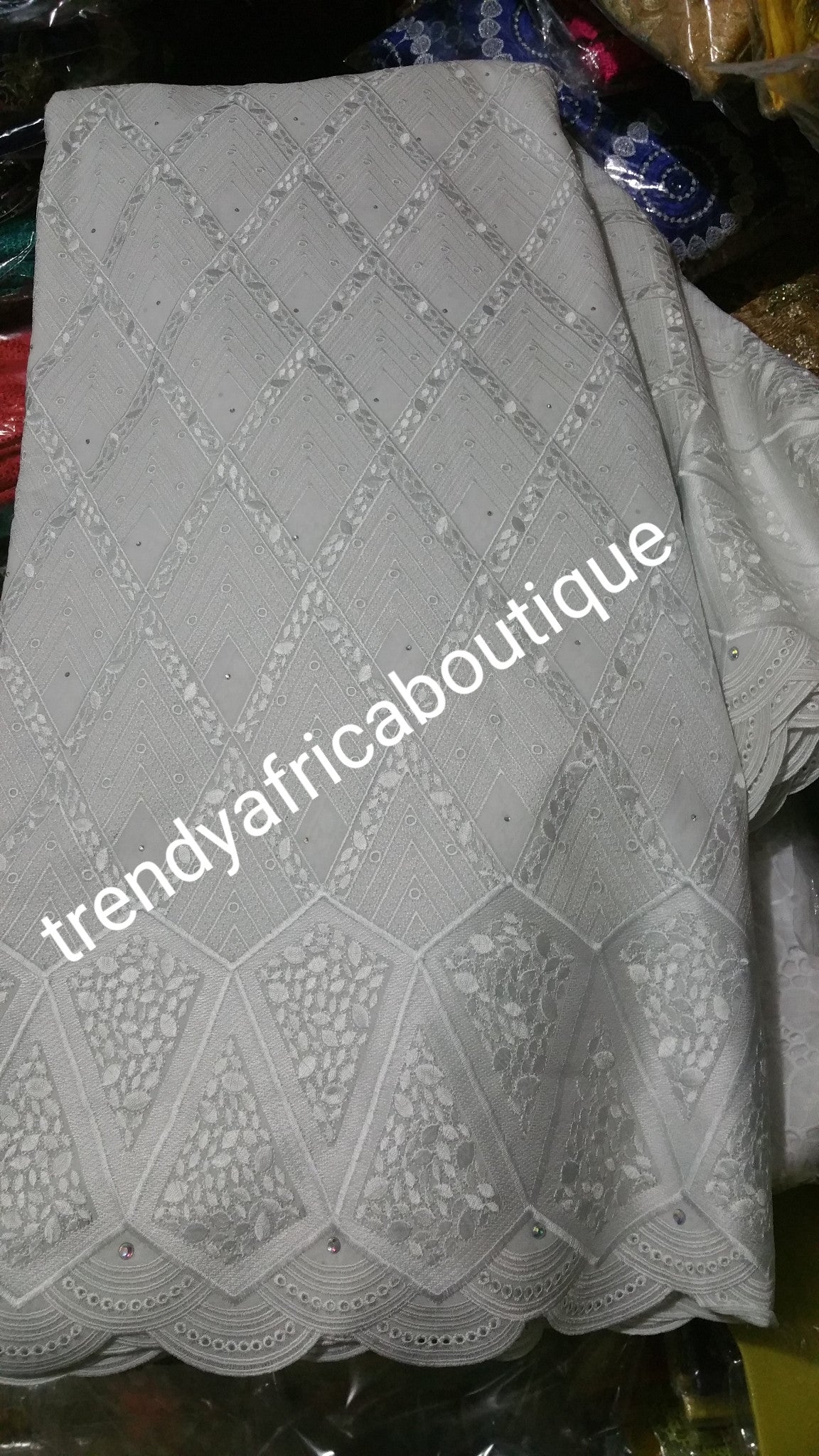 Exclusive design Swiss lace fabric. Original quality design. Soft texture. Sold per 5yds.